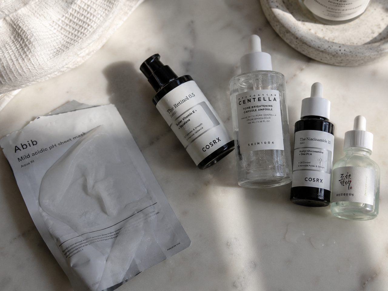 Retinol, sheet masks, and serums laid out — all the things that didn't work